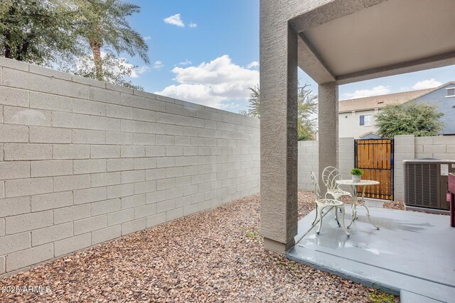 2402 E 5th St Unit 1742, Tempe, AZ 85288 - view of yard featuring cooling unit and a patio area