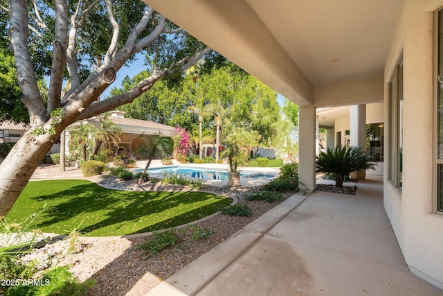 view of patio / terrace featuring an outdoor pool