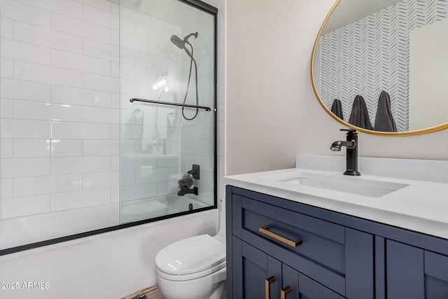 9265 E Kalil Dr, Scottsdale, AZ 85260 - bathroom with vanity, combined bath / shower with glass door, and toilet