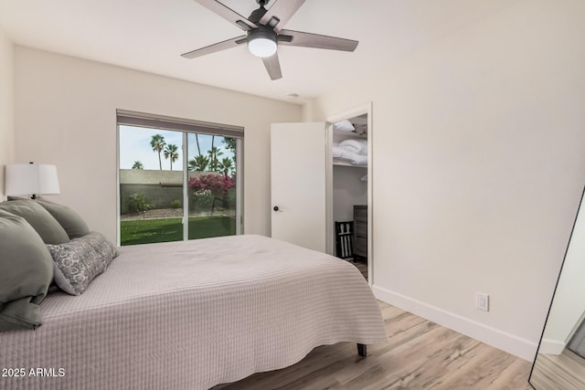 9265 E Kalil Dr, Scottsdale, AZ 85260 - bedroom featuring light wood finished floors, baseboards, and ceiling fan