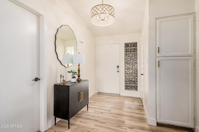 9265 E Kalil Dr, Scottsdale, AZ 85260 - entrance foyer with light wood-style flooring and baseboards