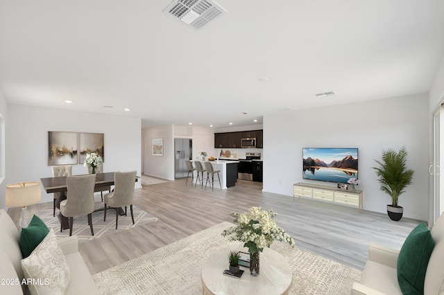 living room featuring light hardwood / wood-style floors