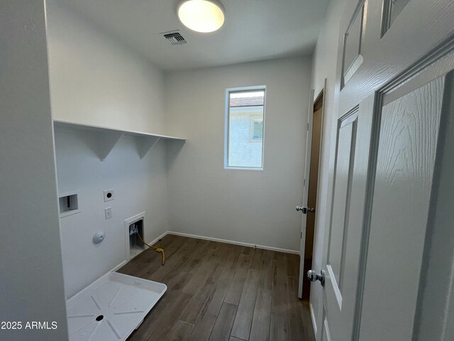 laundry area with wood finished floors, visible vents, hookup for an electric dryer, and laundry area