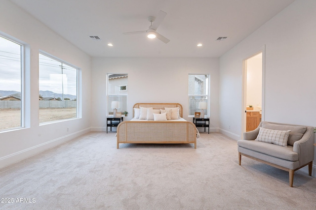 bedroom featuring baseboards, recessed lighting, visible vents, and light carpet