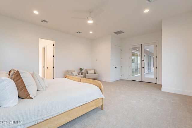 bedroom featuring light colored carpet, recessed lighting, french doors, and visible vents