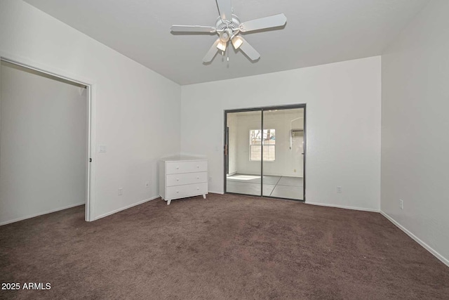 unfurnished bedroom with ceiling fan, baseboards, and carpet