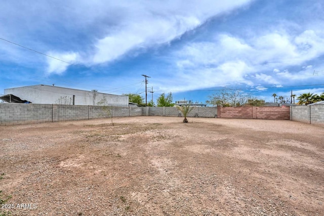 view of yard featuring fence