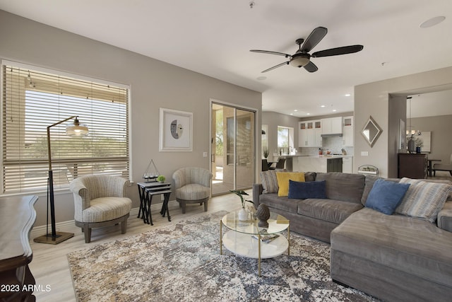 29771 N 67th St, Scottsdale, AZ 85266 - living room with light wood-style flooring, recessed lighting, baseboards, and ceiling fan