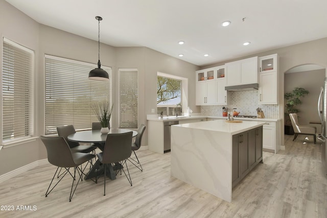 29771 N 67th St, Scottsdale, AZ 85266 - kitchen featuring white cabinetry, light countertops, stainless steel appliances, and tasteful backsplash