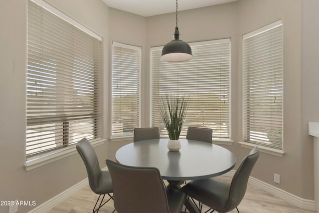 29771 N 67th St, Scottsdale, AZ 85266 - dining space with baseboards and light wood-type flooring