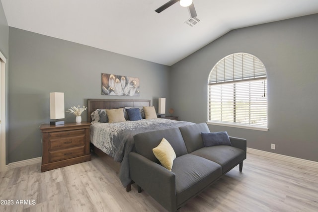 29771 N 67th St, Scottsdale, AZ 85266 - bedroom featuring baseboards, vaulted ceiling, light wood-style flooring, and a ceiling fan