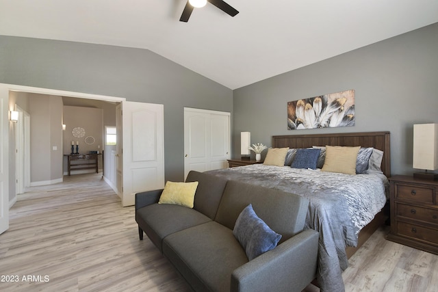 29771 N 67th St, Scottsdale, AZ 85266 - bedroom featuring vaulted ceiling, a closet, baseboards, light wood-style floors, and ceiling fan