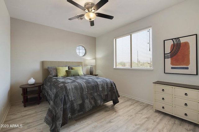 29771 N 67th St, Scottsdale, AZ 85266 - bedroom with visible vents, multiple windows, and light wood-type flooring