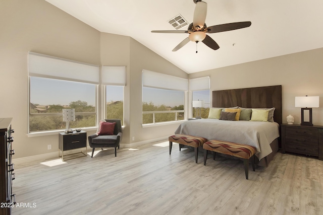 29771 N 67th St, Scottsdale, AZ 85266 - bedroom featuring visible vents, wood finished floors, vaulted ceiling, and multiple windows