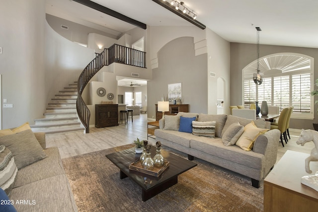 29771 N 67th St, Scottsdale, AZ 85266 - living room featuring plenty of natural light, arched walkways, a chandelier, and visible vents