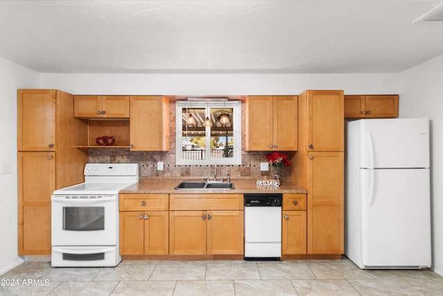 kitchen featuring white appliances, light tile patterned floors, tasteful backsplash, and sink