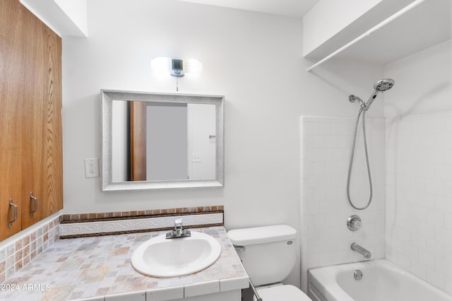 bathroom with toilet, shower / washtub combination, and vanity