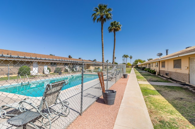 pool featuring fence