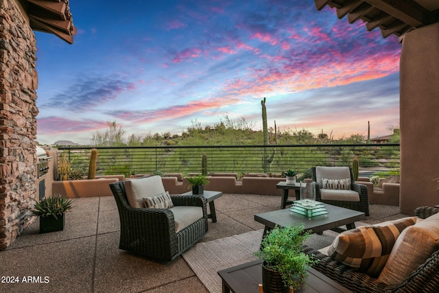 patio terrace at dusk with outdoor lounge area