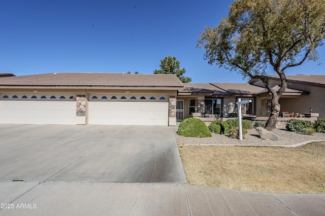 single story home with a garage