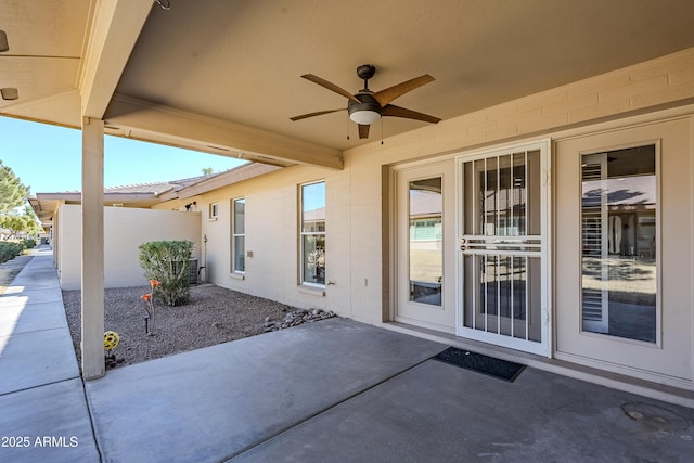 view of patio featuring ceiling fan