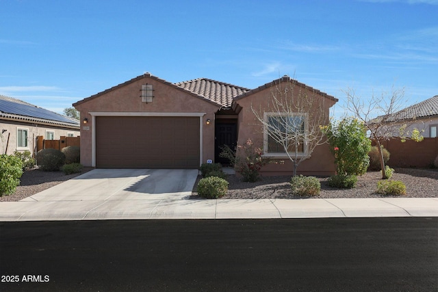 view of front of property featuring a garage