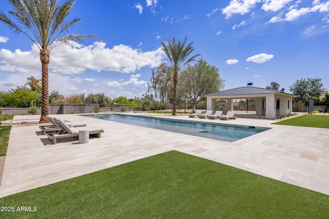 view of pool featuring a fenced in pool, a patio area, a gazebo, and a yard