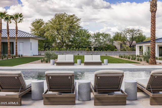 view of pool featuring a patio area and a fenced in pool