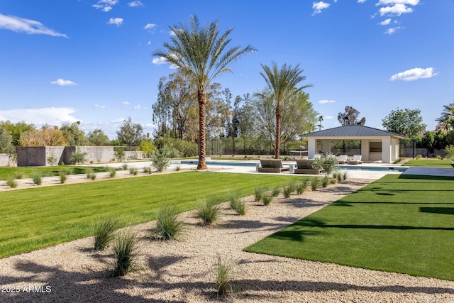view of home's community featuring a yard, a pool, and a gazebo