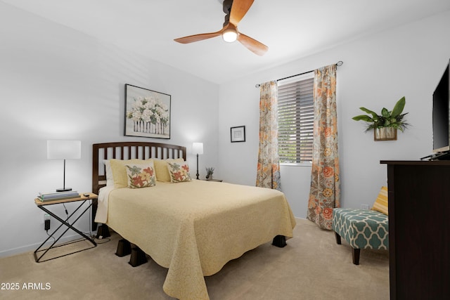 carpeted bedroom featuring a ceiling fan