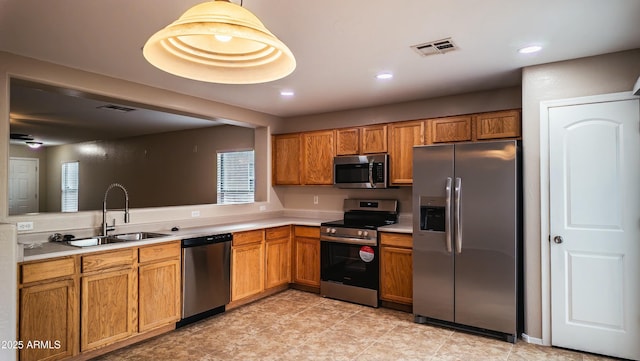 kitchen with appliances with stainless steel finishes and sink