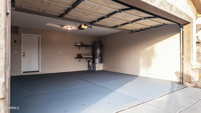 garage with a garage door opener and water heater