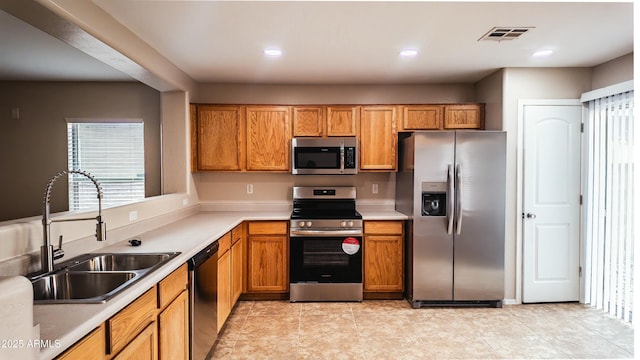 kitchen with stainless steel appliances and sink