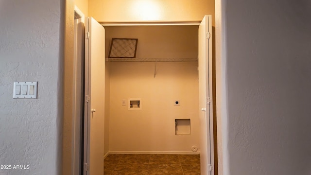 laundry room featuring electric dryer hookup and washer hookup