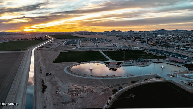 aerial view at dusk with a mountain view