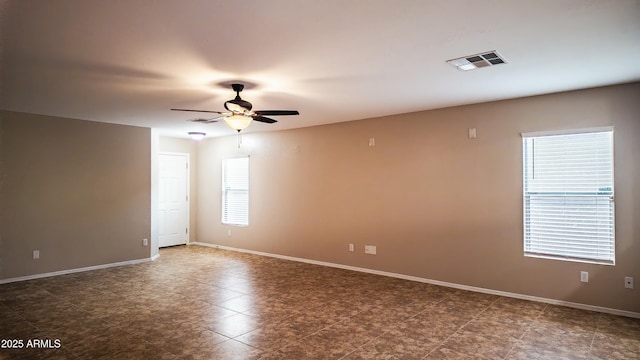 spare room featuring ceiling fan