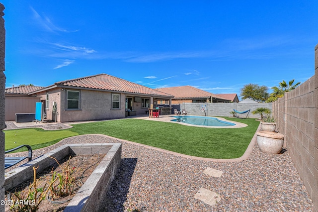 view of yard with a fenced in pool, a patio, and a fenced backyard