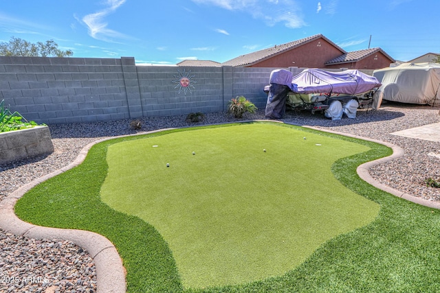 view of yard with a fenced backyard