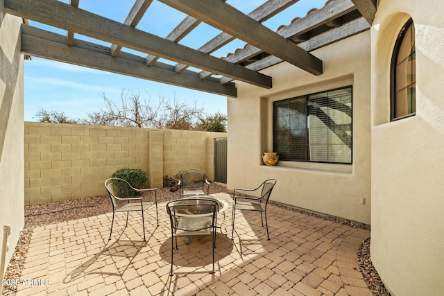 891 W Palo Brea Dr, Litchfield Park, AZ 85340 - view of patio featuring a pergola, a fenced backyard, and a fire pit