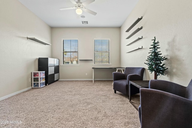 891 W Palo Brea Dr, Litchfield Park, AZ 85340 - living area featuring baseboards, visible vents, ceiling fan, and carpet flooring