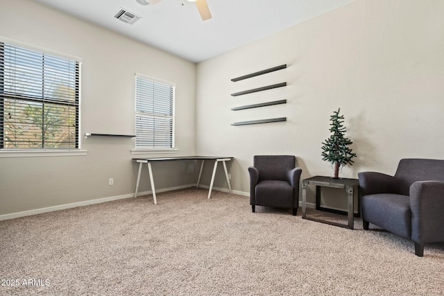 891 W Palo Brea Dr, Litchfield Park, AZ 85340 - living area with a ceiling fan, visible vents, baseboards, and carpet