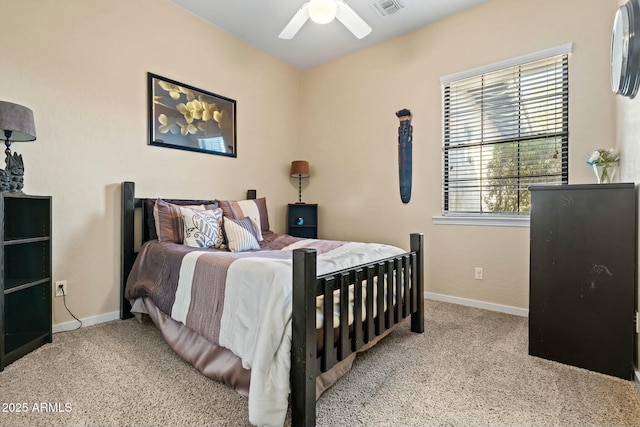 891 W Palo Brea Dr, Litchfield Park, AZ 85340 - bedroom with baseboards, visible vents, light colored carpet, and a ceiling fan