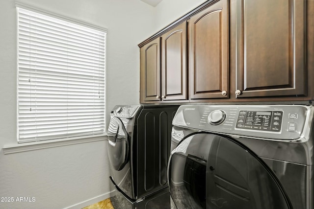 891 W Palo Brea Dr, Litchfield Park, AZ 85340 - laundry area featuring cabinet space, baseboards, and washer and dryer