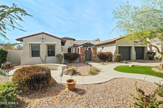 891 W Palo Brea Dr, Litchfield Park, AZ 85340 - mediterranean / spanish-style home with stucco siding, fence, driveway, a garage, and a tile roof