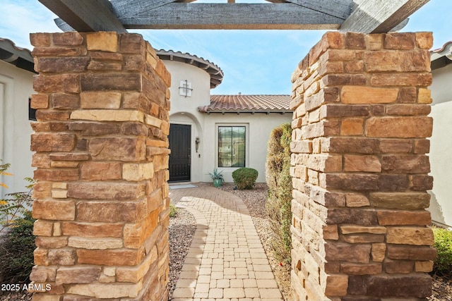 891 W Palo Brea Dr, Litchfield Park, AZ 85340 - doorway to property with stucco siding and a tile roof