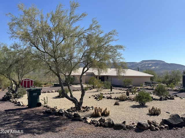 exterior space featuring a mountain view