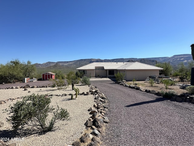 view of front of home featuring a mountain view