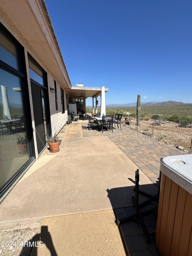 view of patio featuring a mountain view