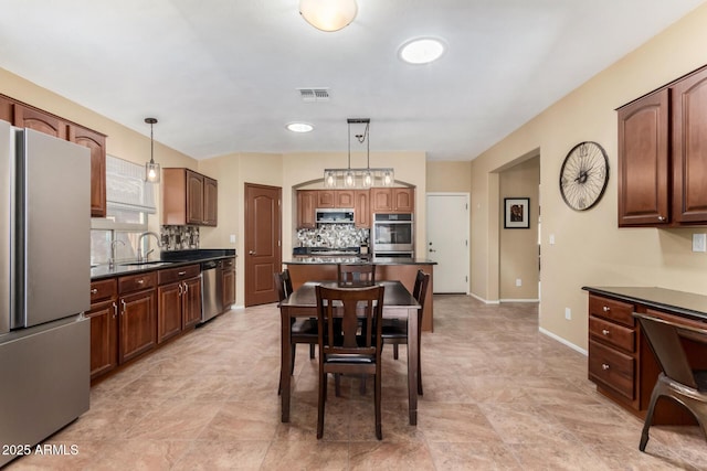 dining room featuring sink