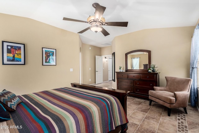 bedroom featuring vaulted ceiling and ceiling fan